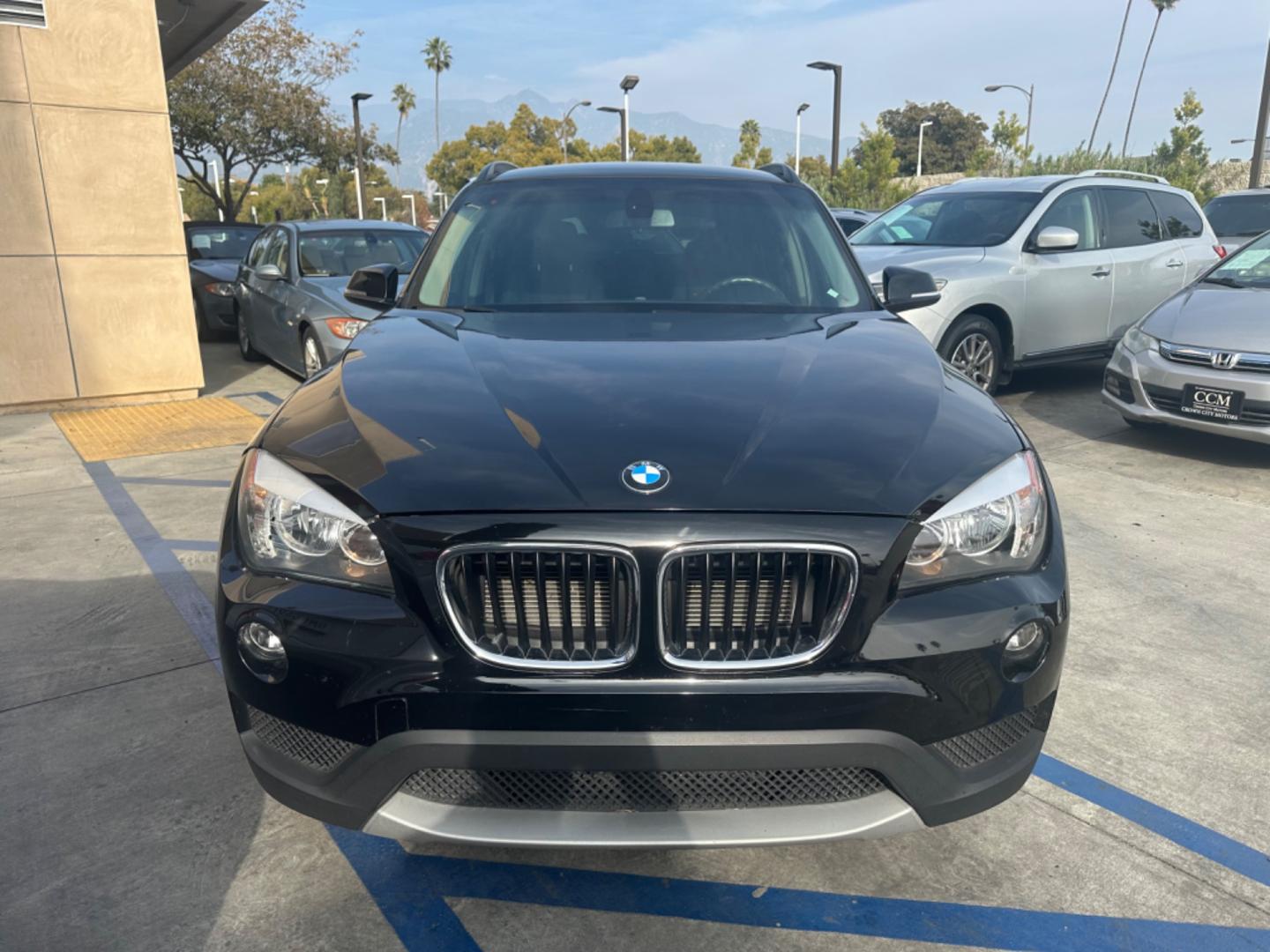 2014 Black /Black BMW X1 (WBAVM1C57EV) with an 4 CYLINDER engine, Automatic transmission, located at 30 S. Berkeley Avenue, Pasadena, CA, 91107, (626) 248-7567, 34.145447, -118.109398 - Photo#7